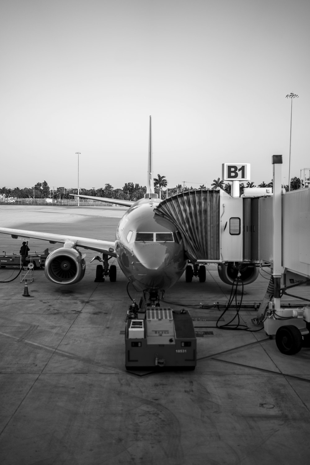 a large jetliner sitting on top of an airport tarmac