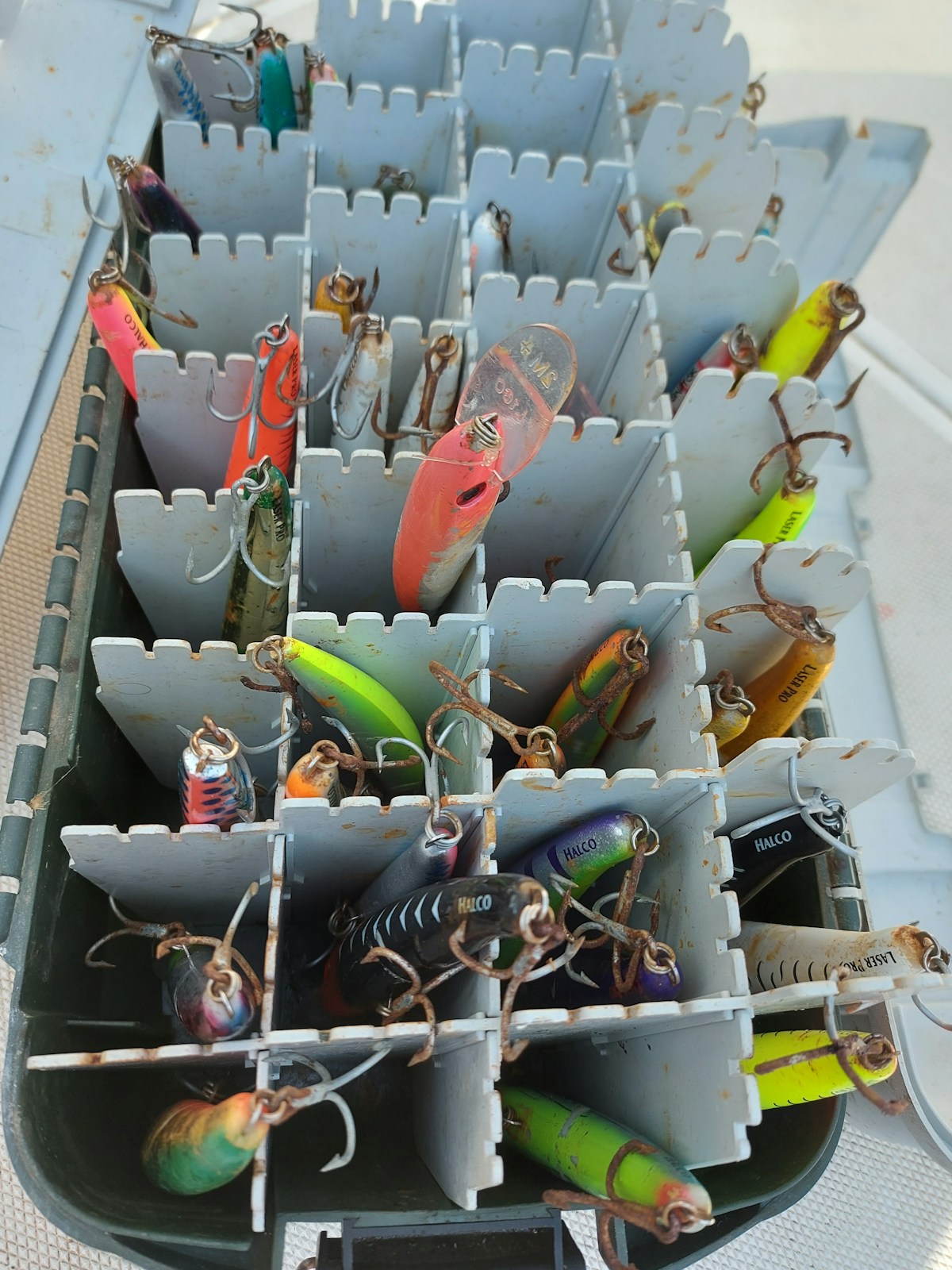 a-bunch-of-fishing-lures-are-in-a-bin-LM07Ztyaqbo collection background image