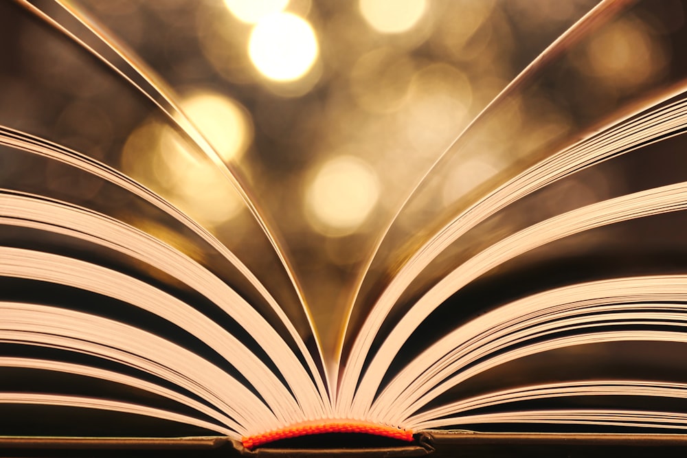 an open book sitting on top of a table