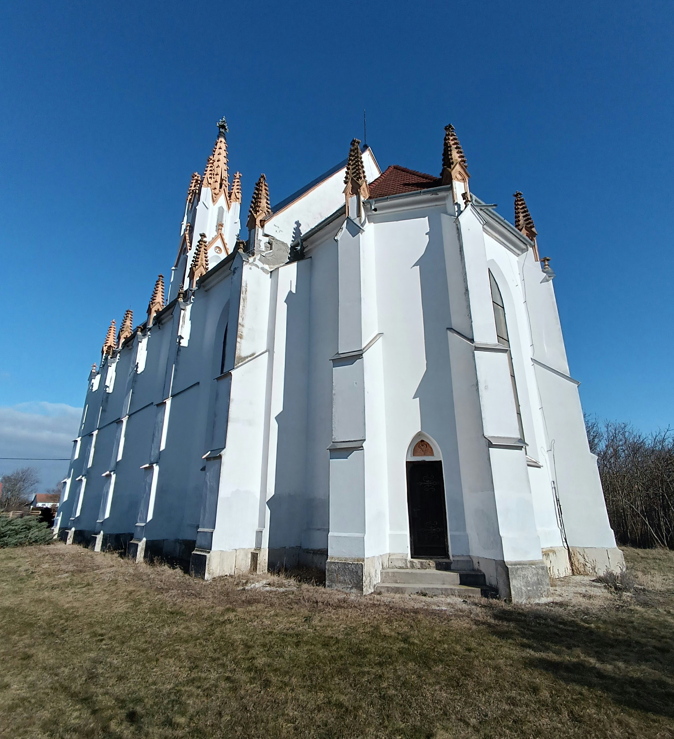 a large white church with a red roof