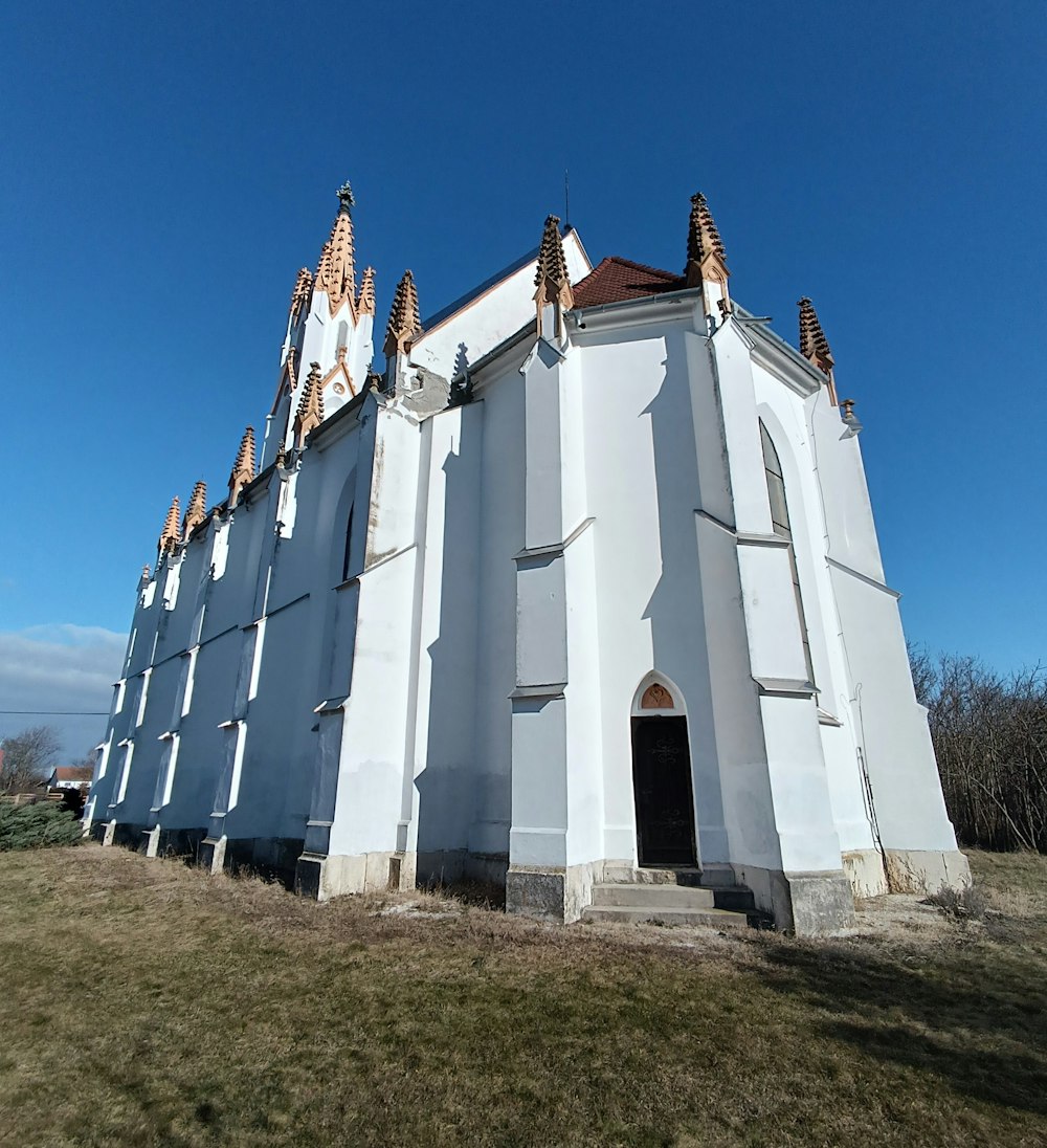 a large white church with a red roof