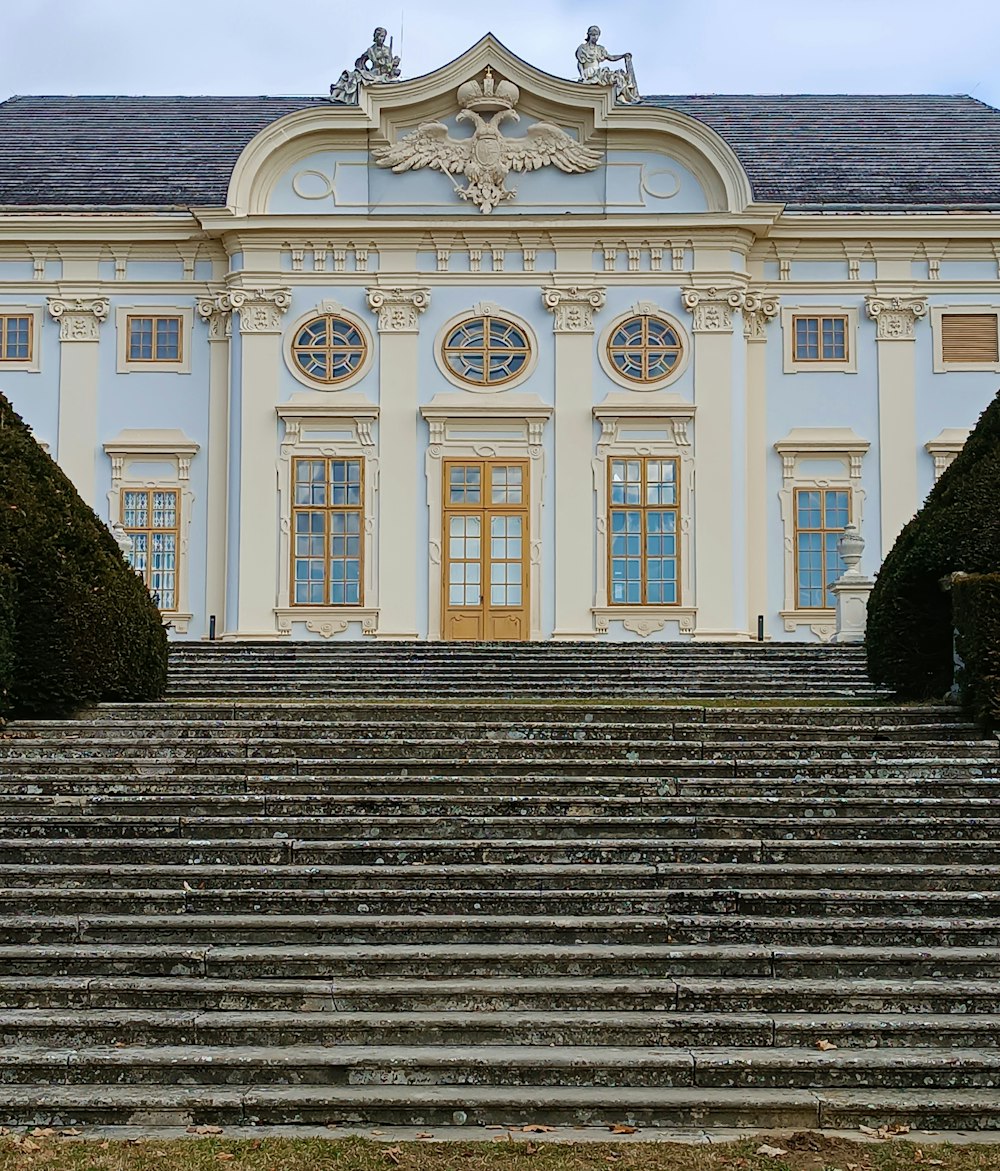 a large white building with steps leading up to it