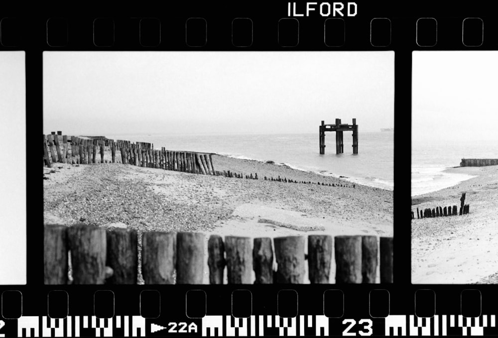 a black and white photo of a beach