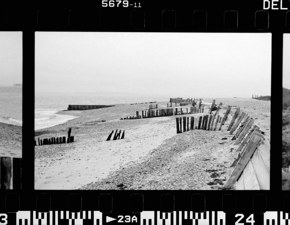 a black and white photo of a beach
