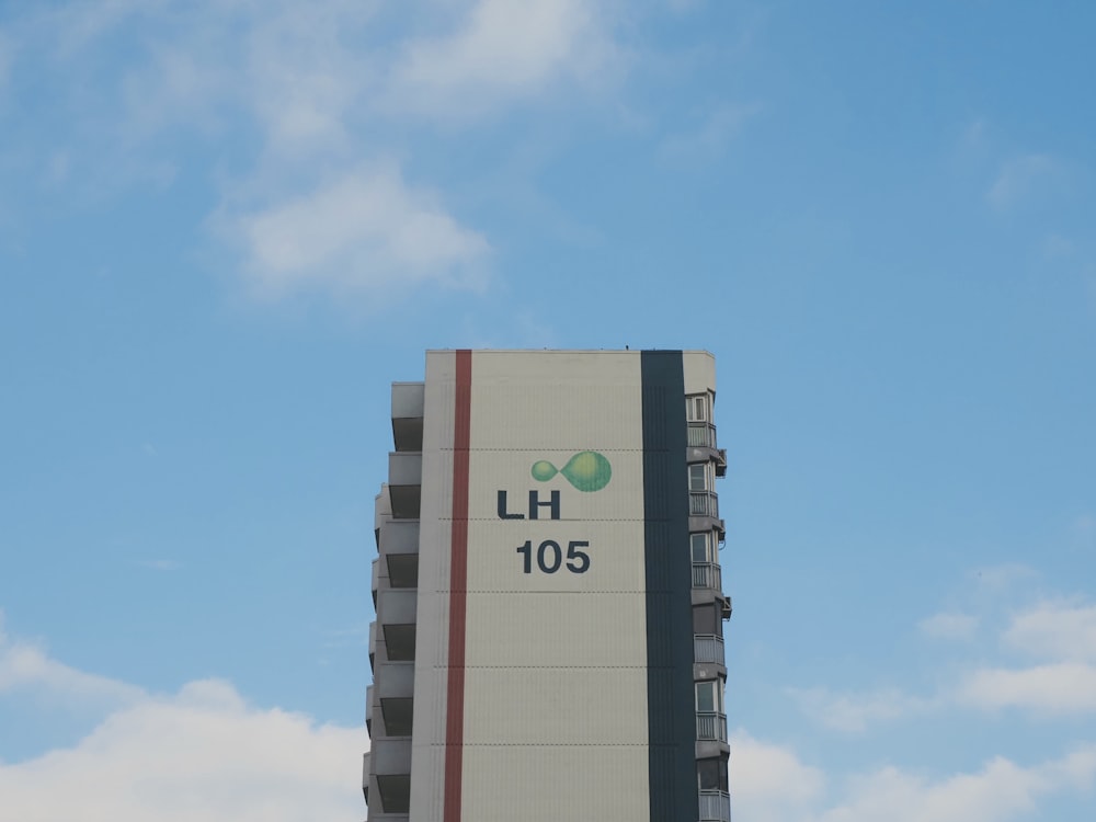 a tall building with a sky background