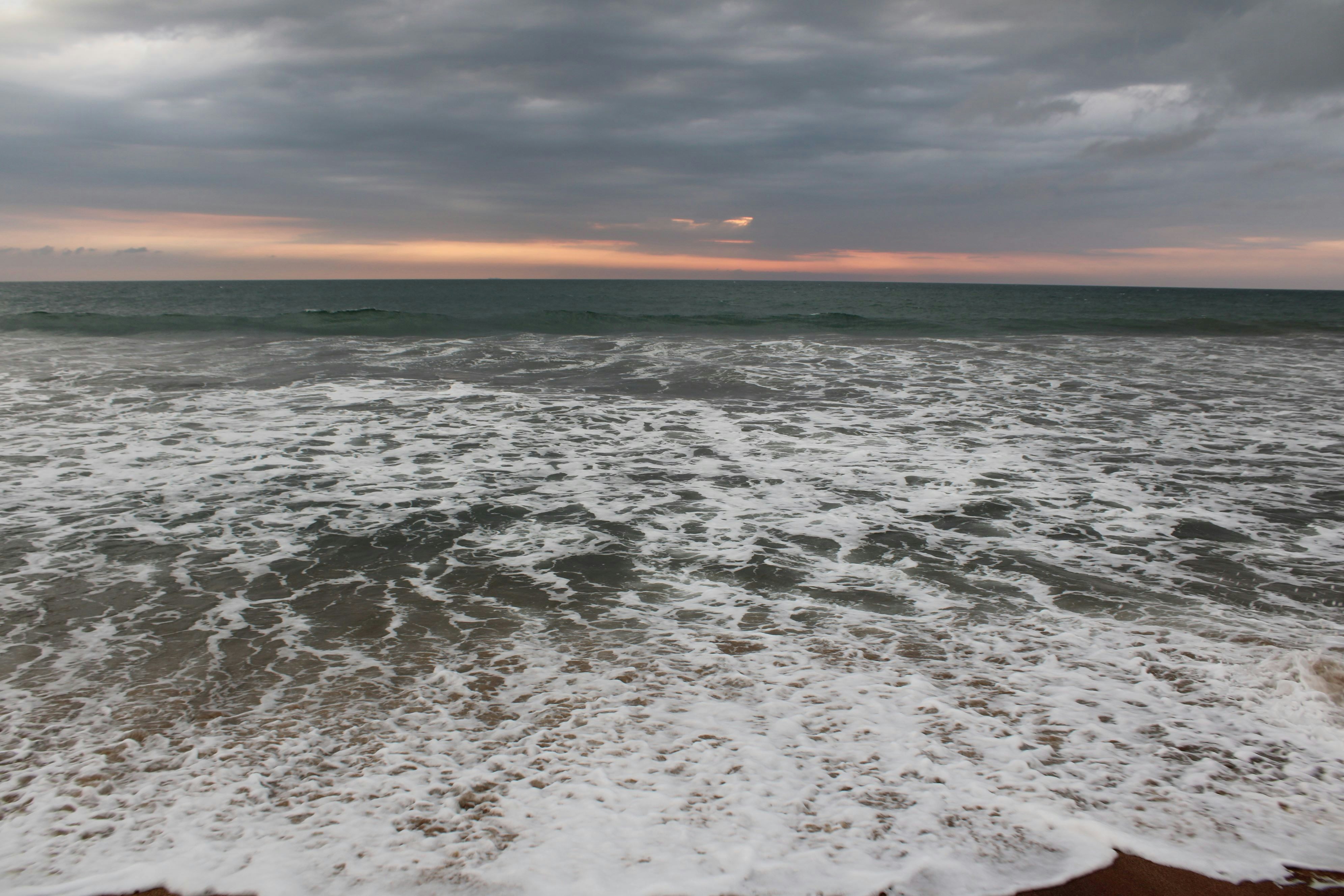 a view of the ocean from a beach