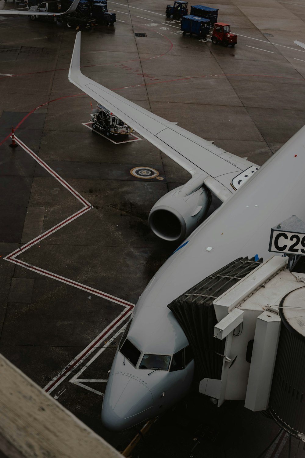 a large jetliner sitting on top of an airport tarmac