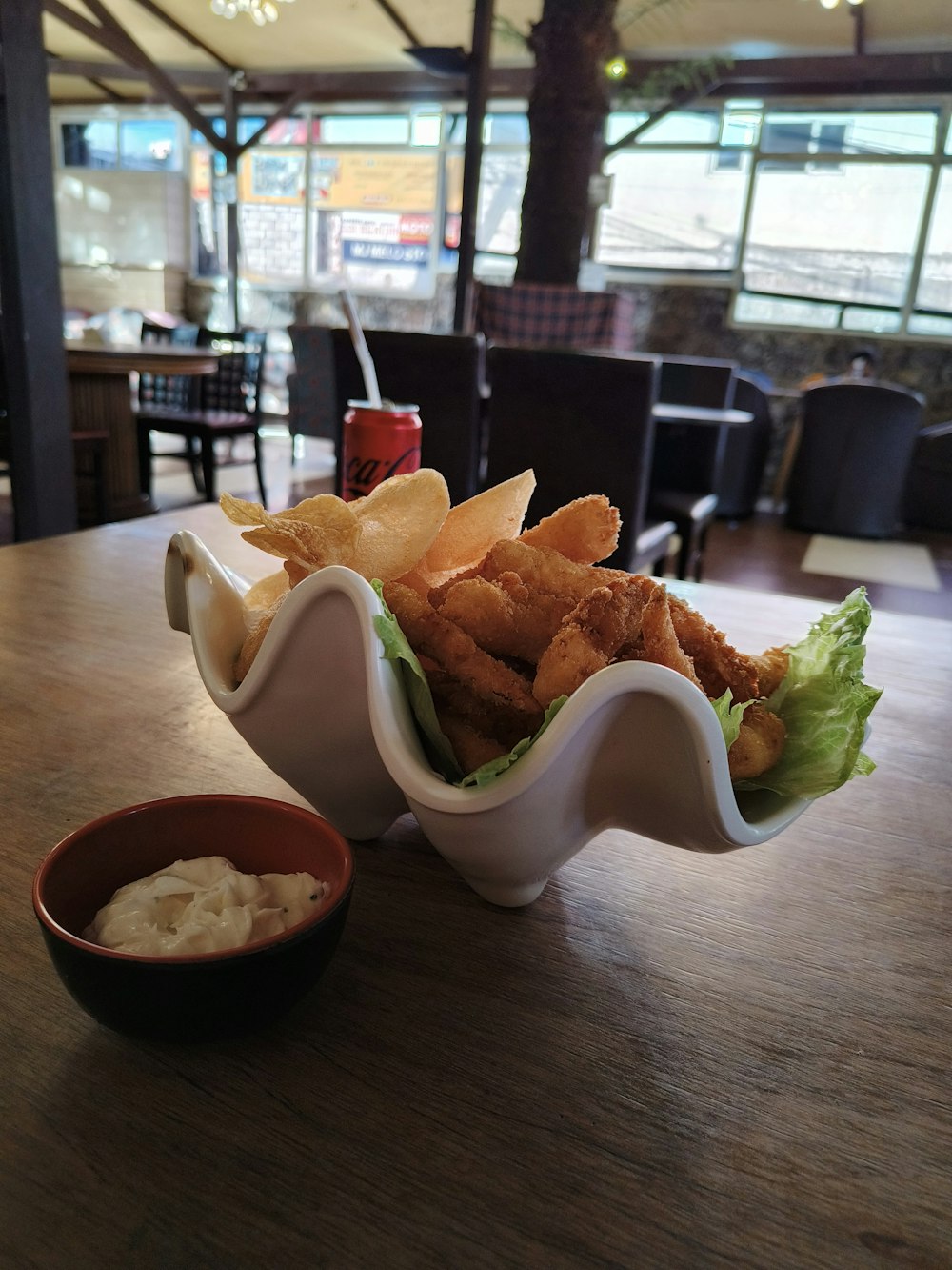 a close up of a bowl of food on a table