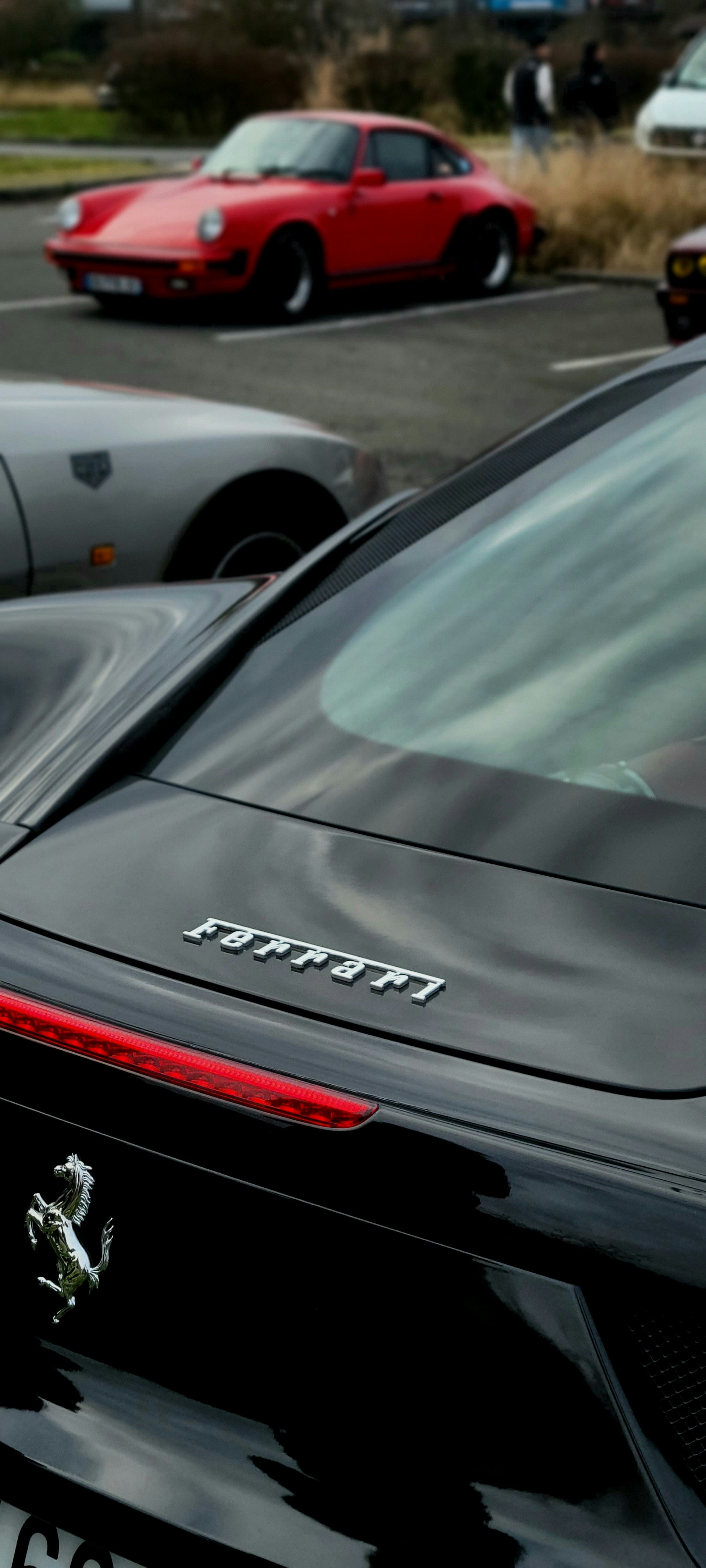 a close up of a car parked in a parking lot