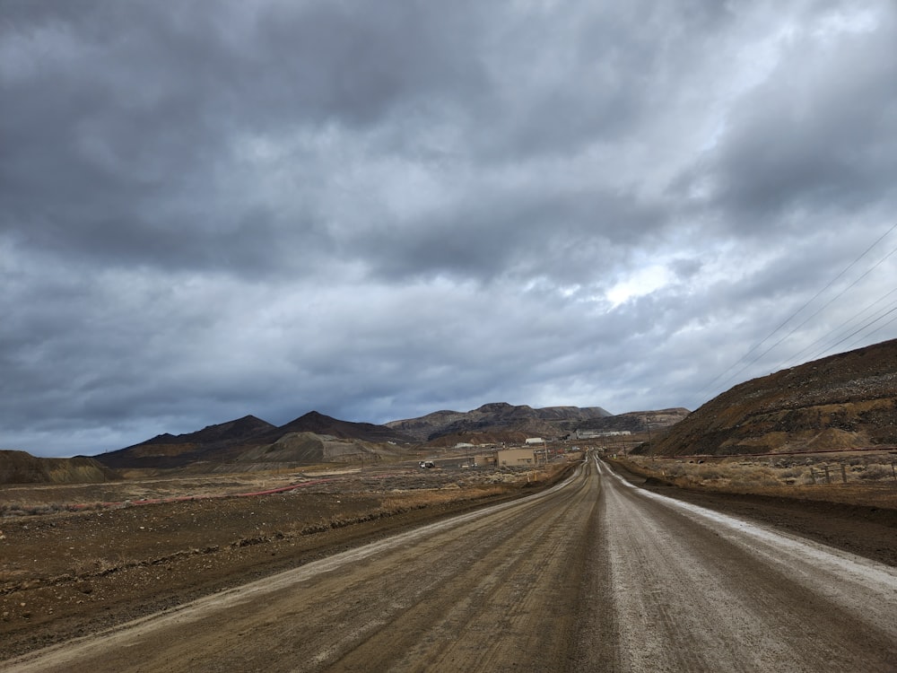 a dirt road in the middle of nowhere