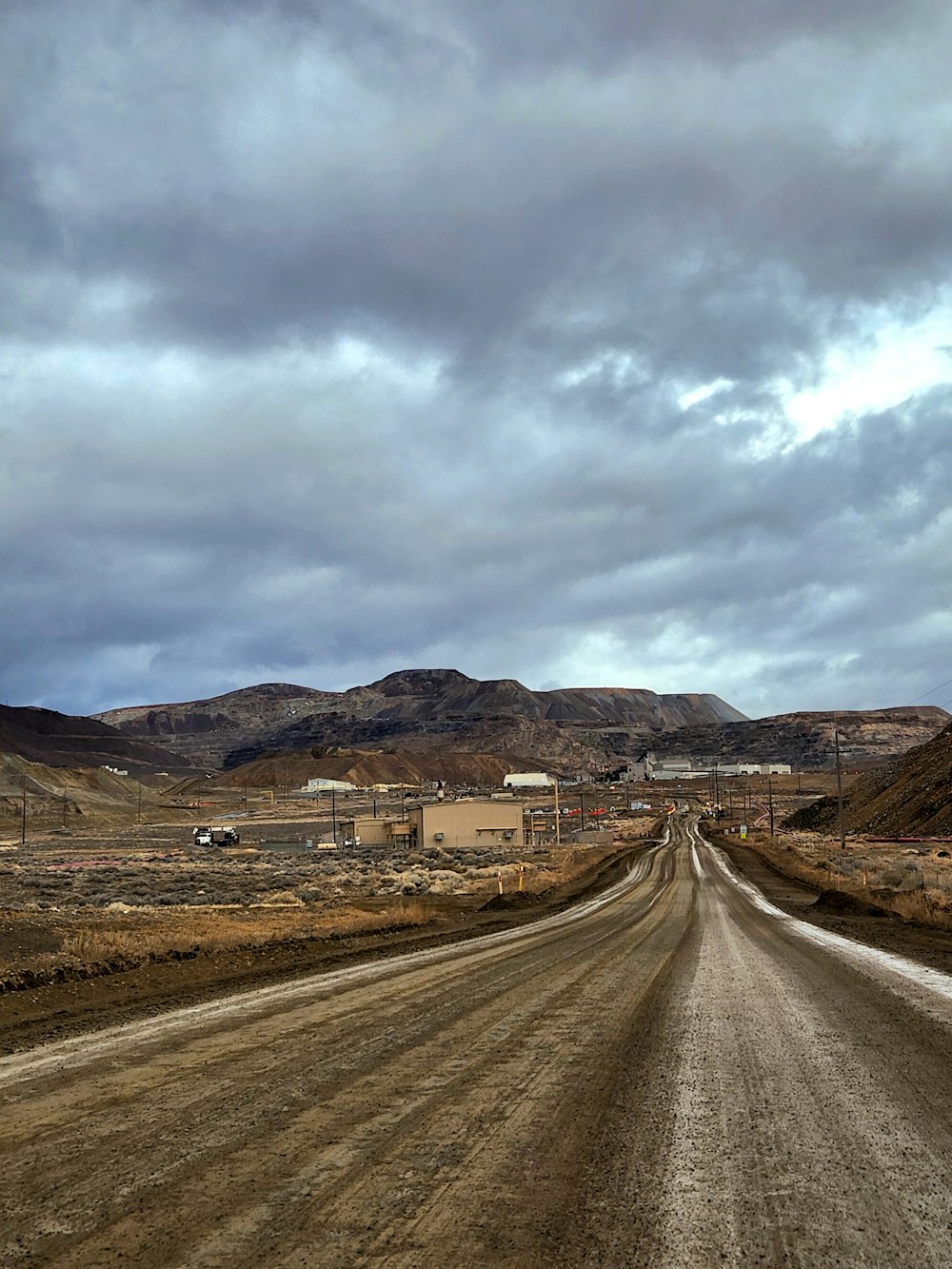 a dirt road in the middle of nowhere