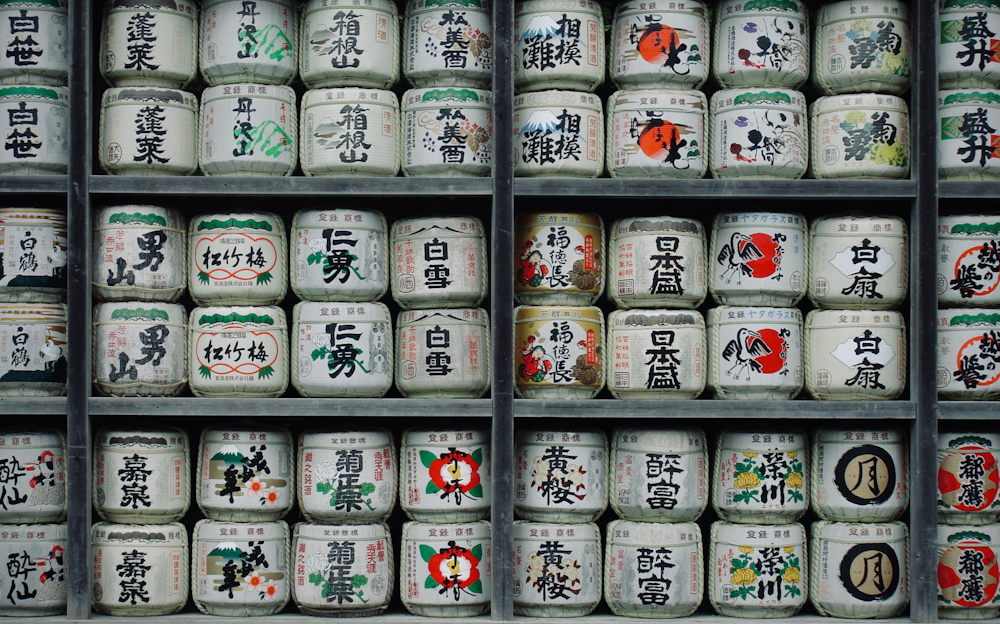 a shelf filled with lots of different kinds of jars