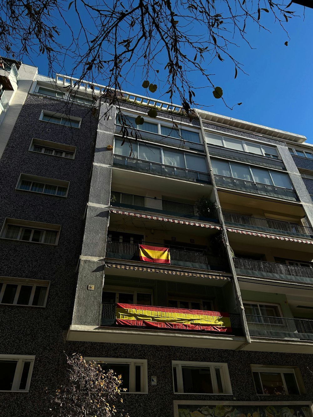 a tall building with balconies and balconies on the balconies