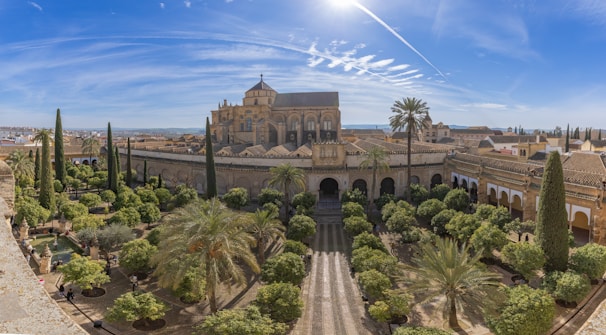 an aerial view of a building in a park