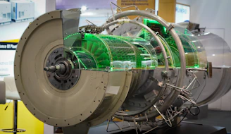 a machine with a green light inside of it
