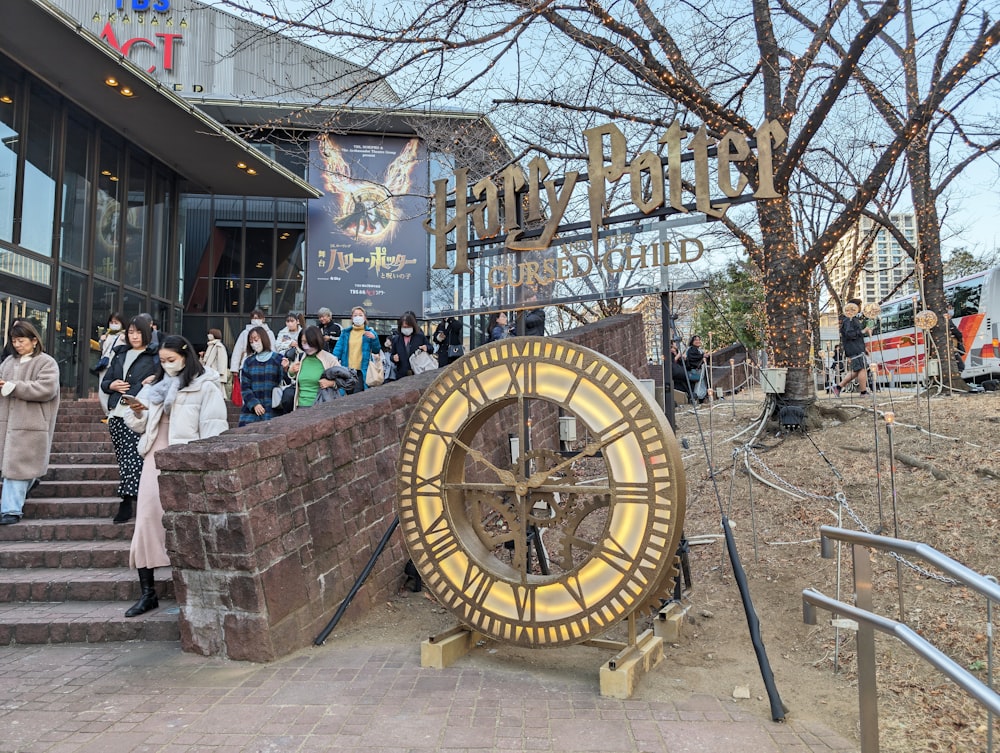 a group of people standing outside of a building