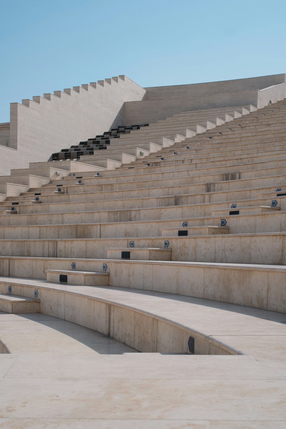 a row of stone steps in front of a building