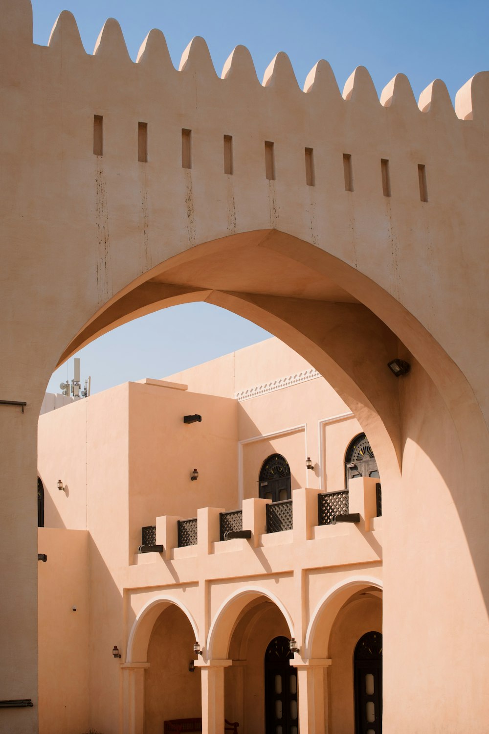 a building with a large archway in the middle of it