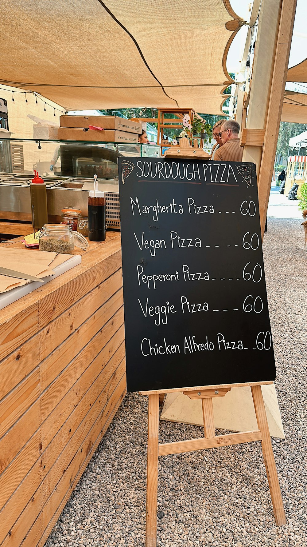 a black board with a menu written on it