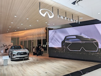 a car is on display in a showroom