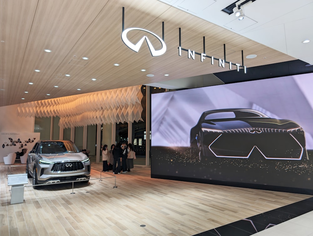 a car is on display in a showroom