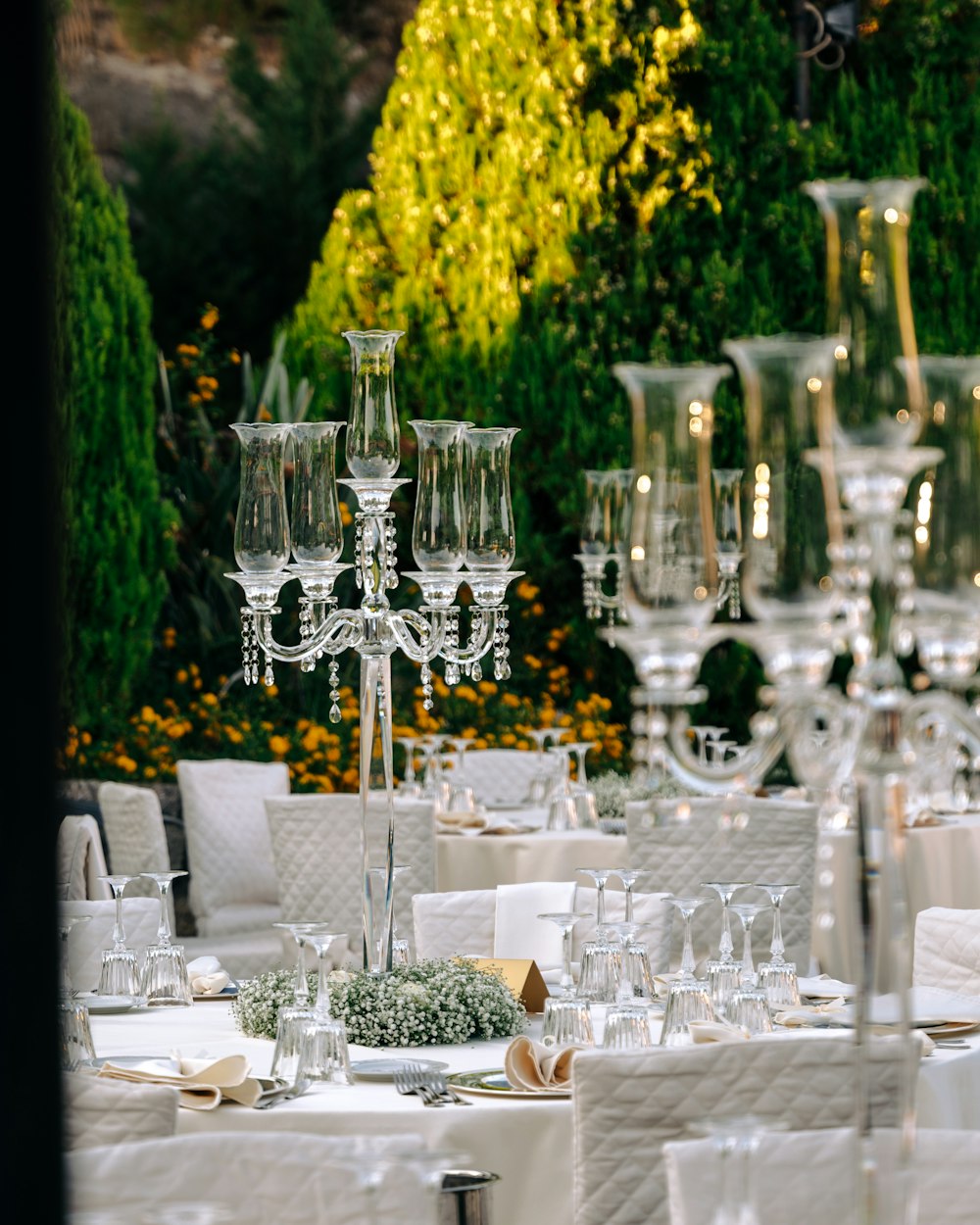 a table with a bunch of wine glasses on it