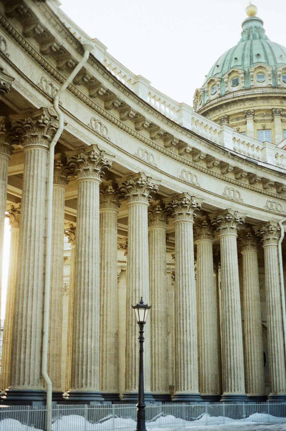 a large building with columns and a dome