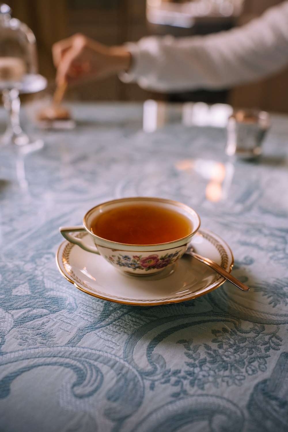 a cup of tea sitting on top of a saucer