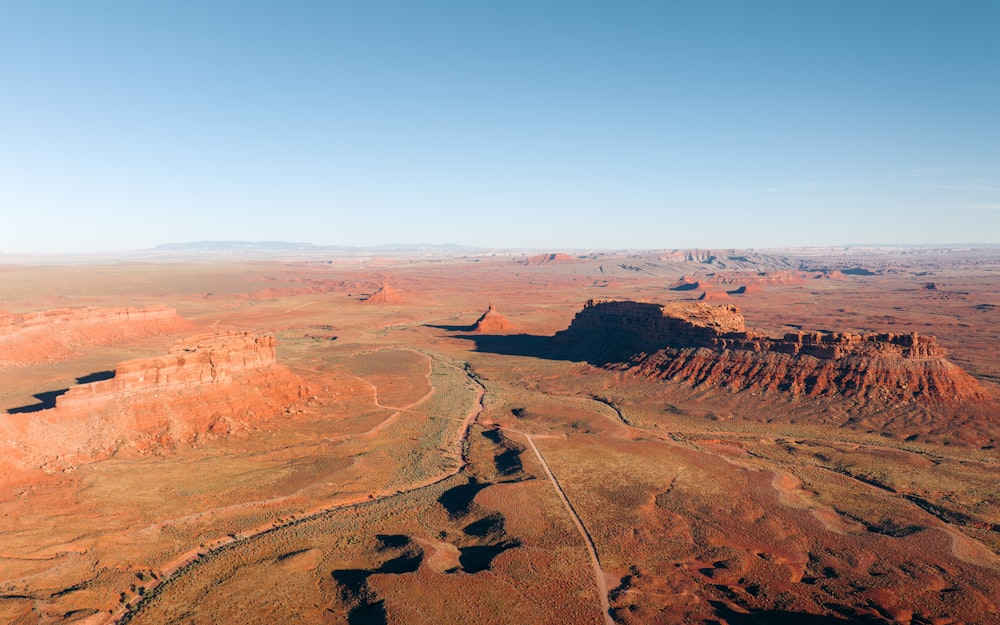 an aerial view of a canyon with a river running through it