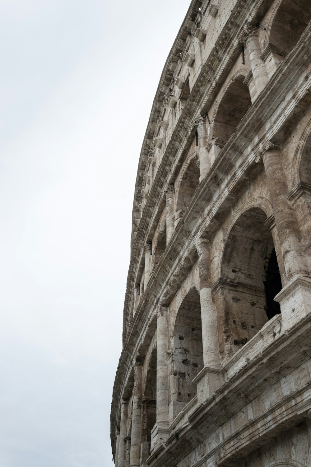 a close up of the side of an ancient building