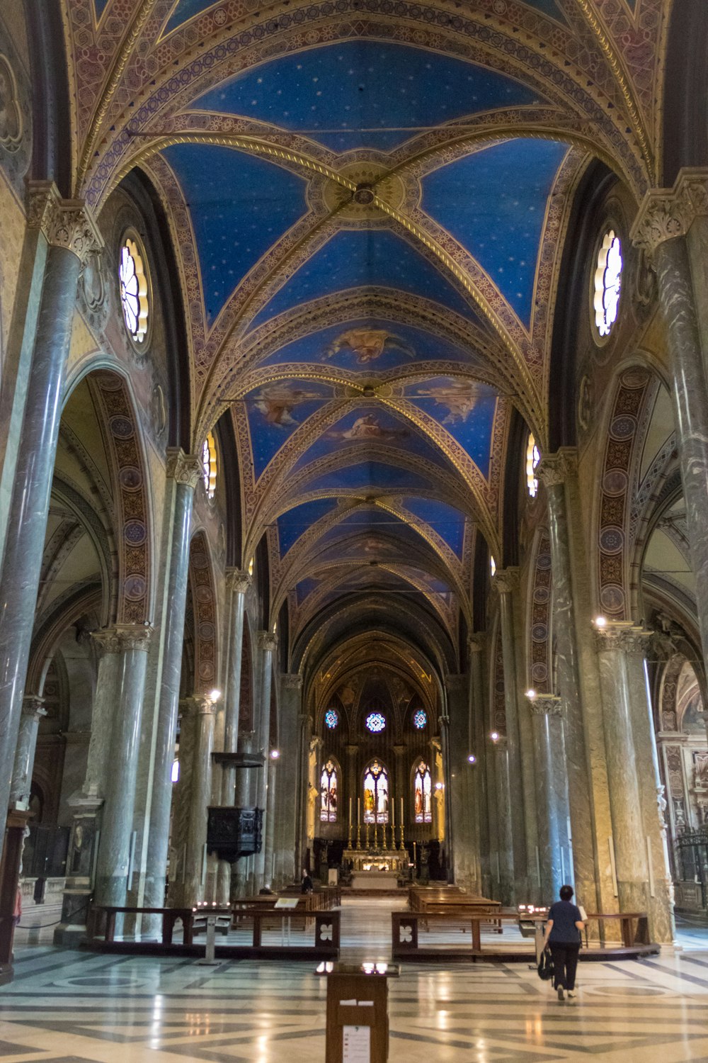 a large cathedral with vaulted ceilings and a blue sky