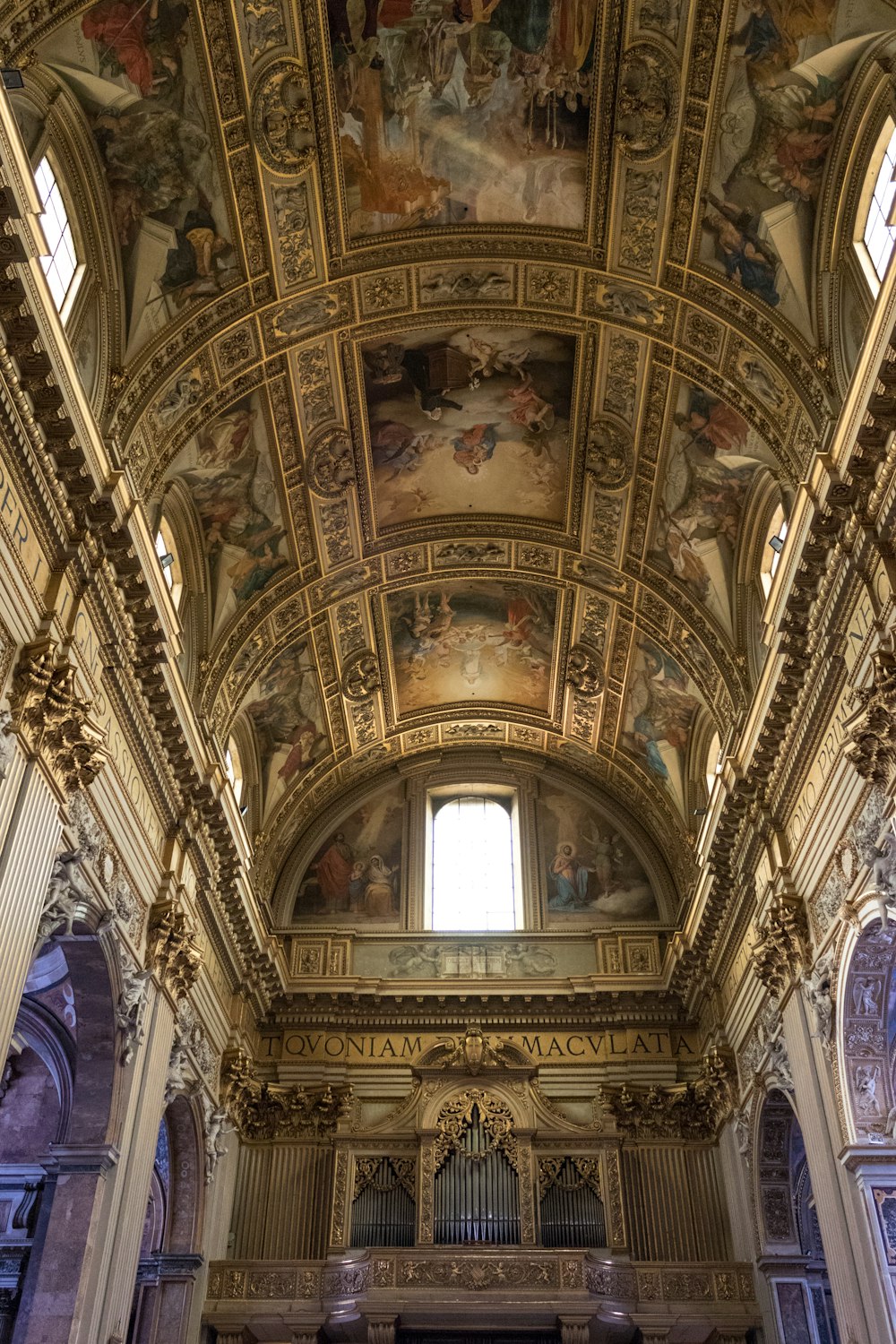 a large cathedral with a painting on the ceiling