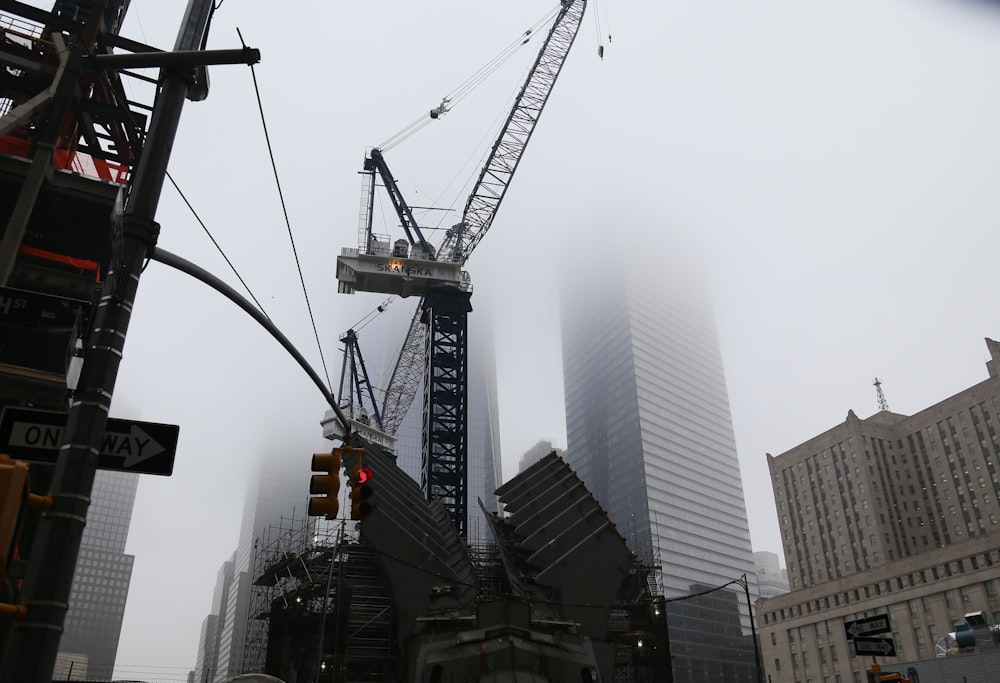 a crane that is on top of a building