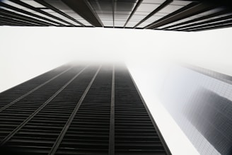 a very tall building towering over a city