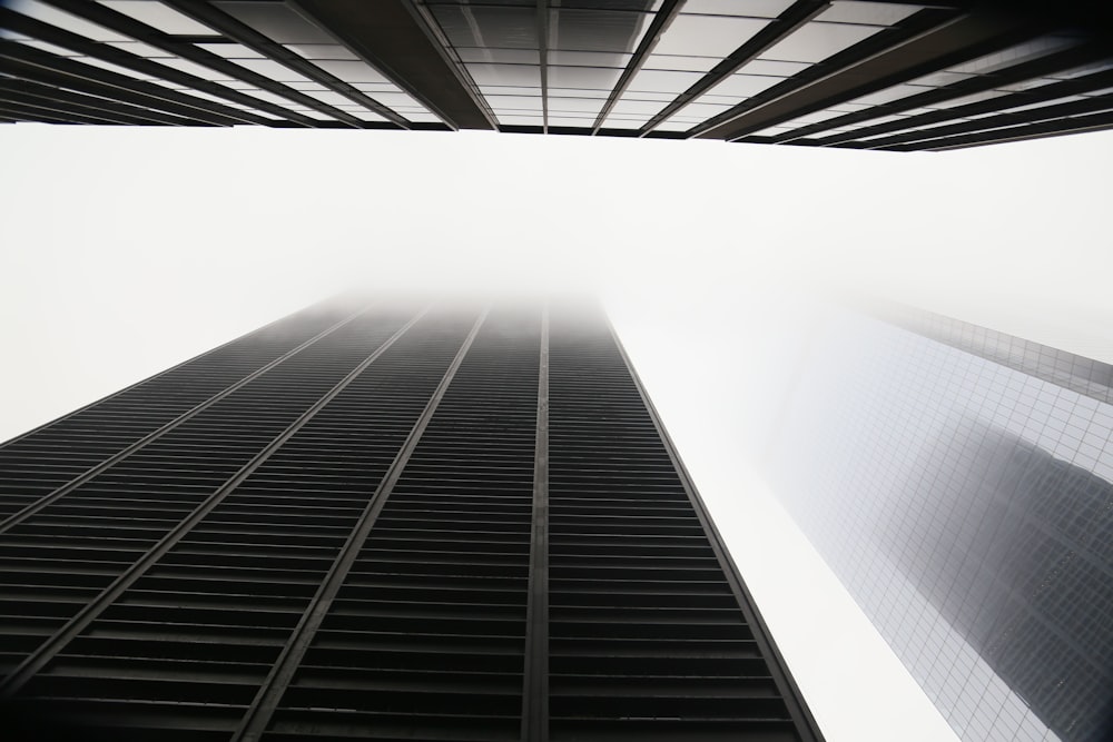 a very tall building towering over a city