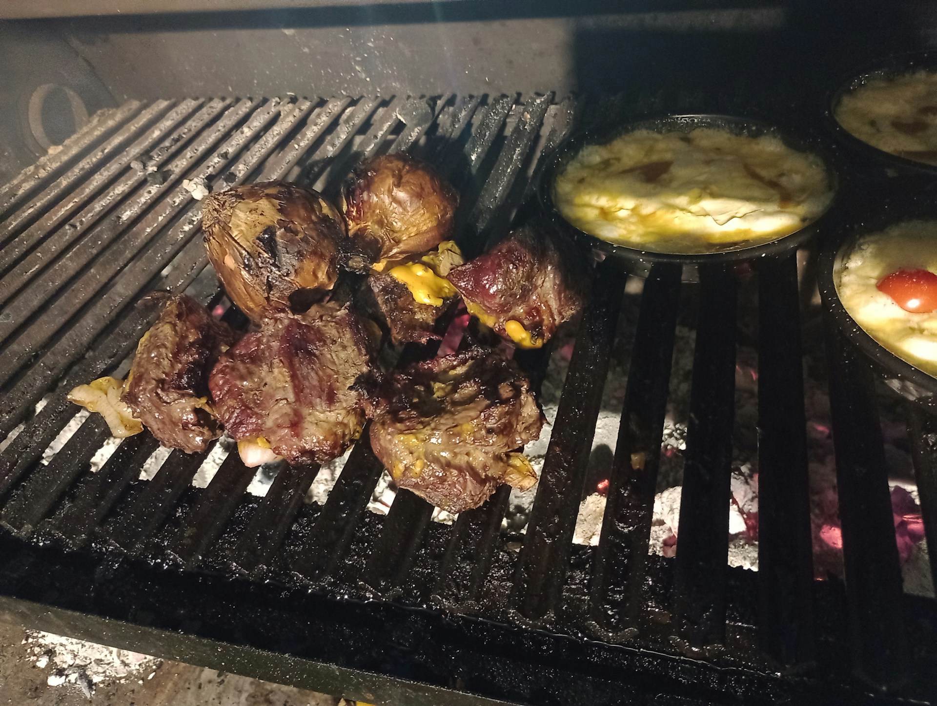 a grill that has some food on it