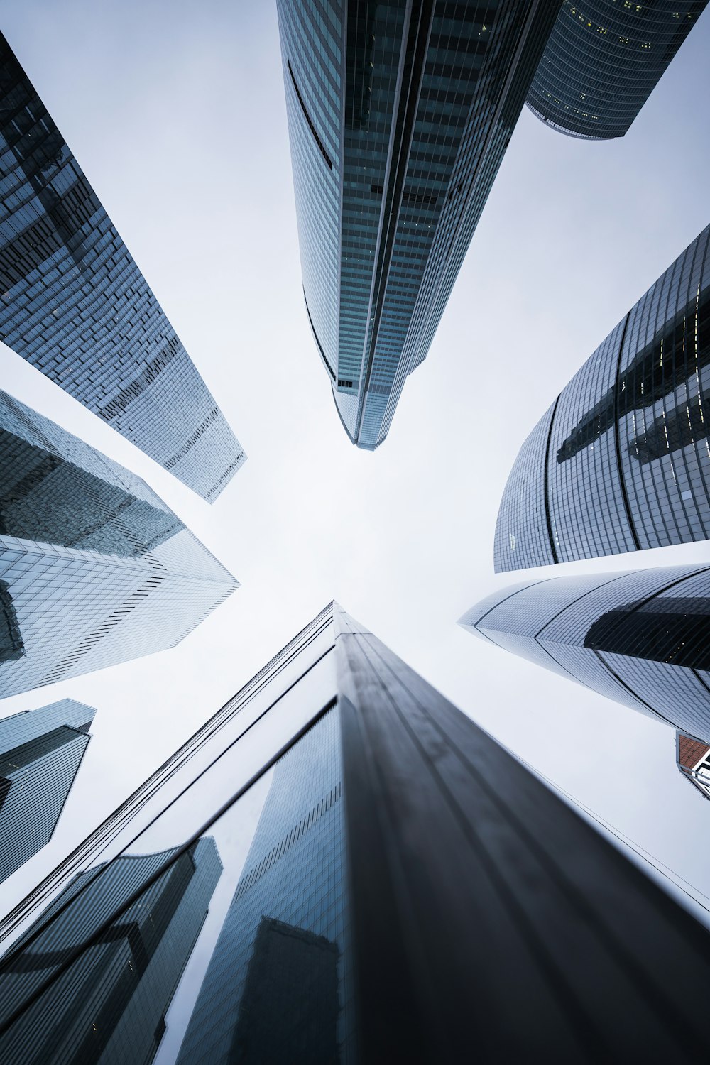 a group of tall buildings towering over a city