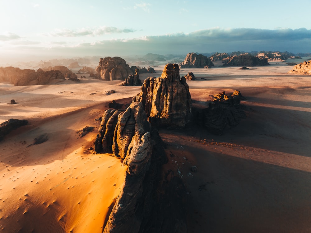 a desert landscape with rocks and sand