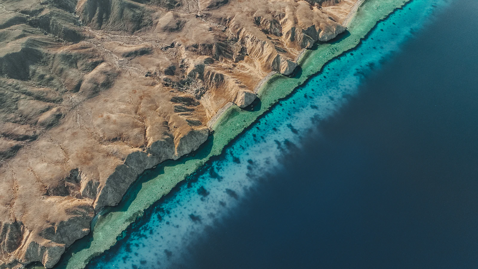 Calm sea and desert mountains