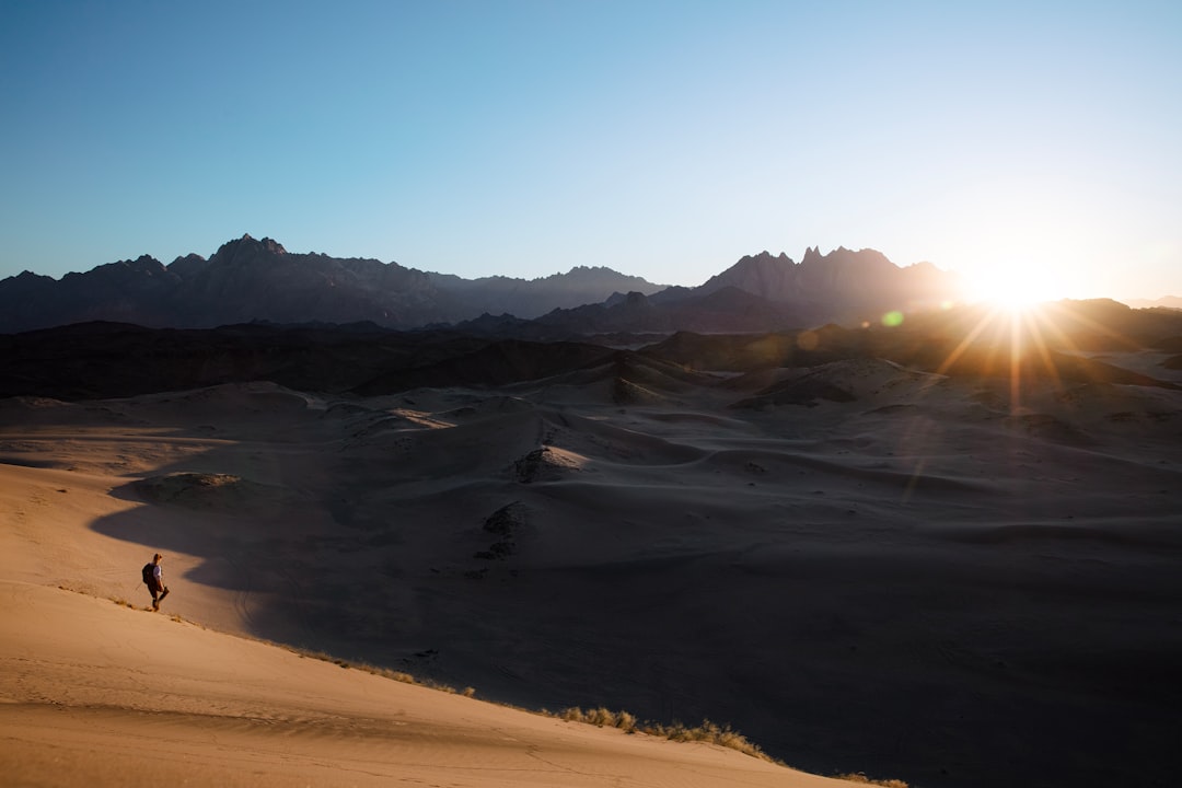 Mesmerizing red sand dunes and endless mountain valleys providing iconic views across NEOM | NEOM, Saudi Arabia