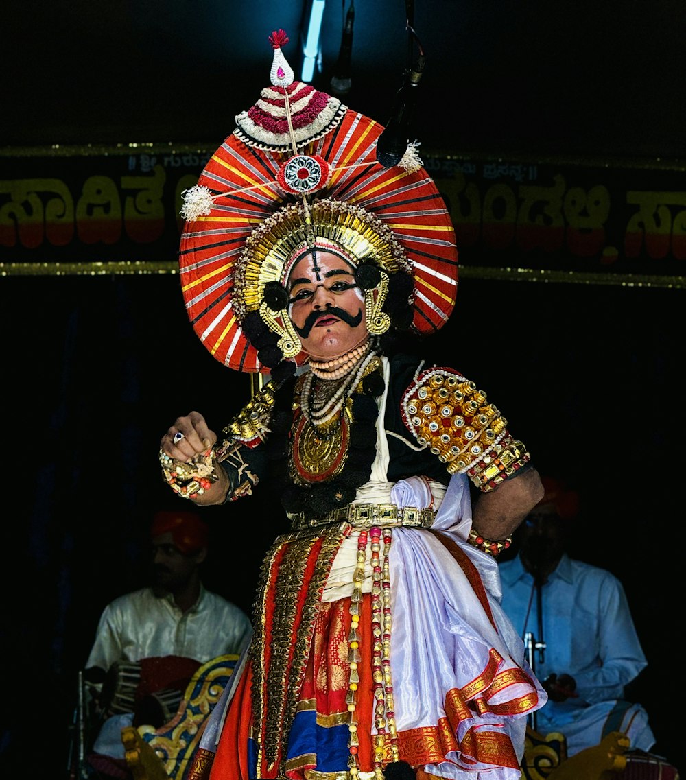 a man in a costume performing a dance