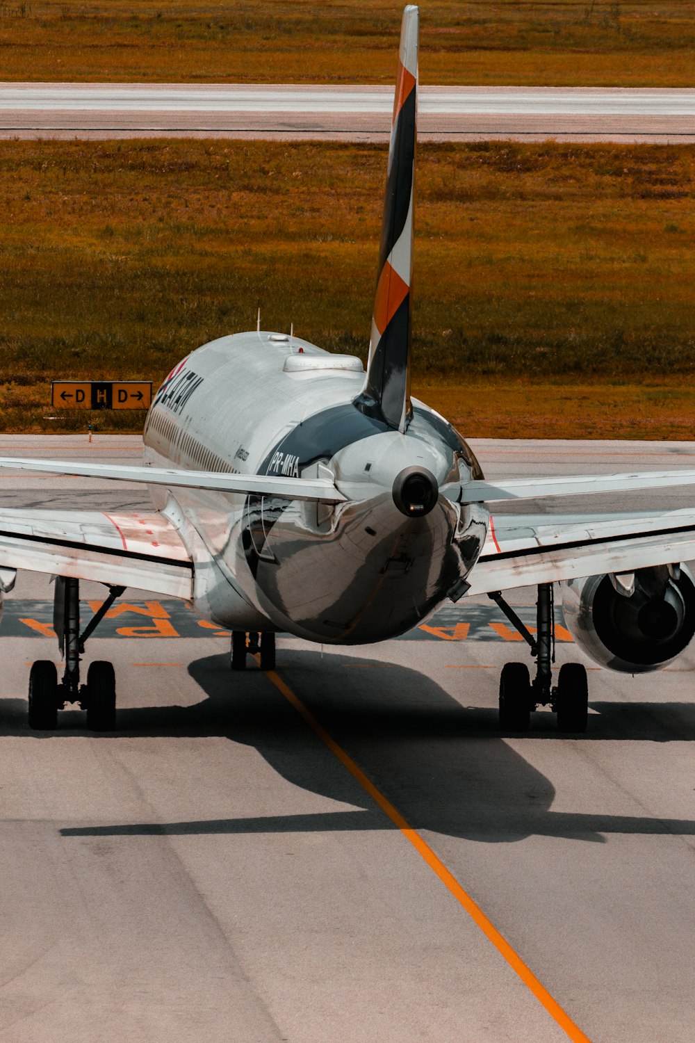 a small airplane is sitting on the runway