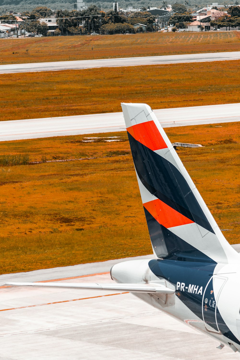 a large jetliner sitting on top of an airport tarmac