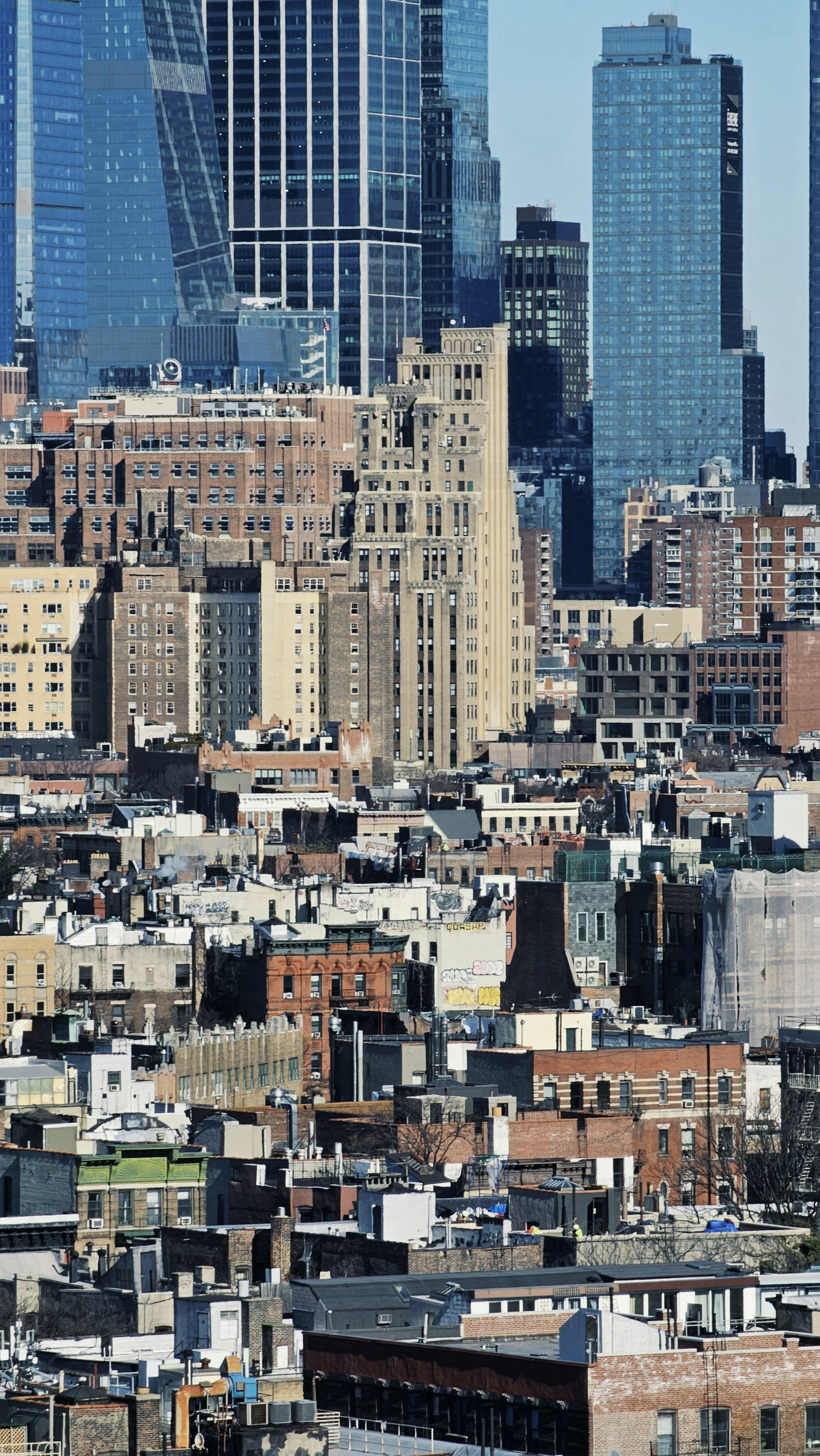 a view of a city with tall buildings