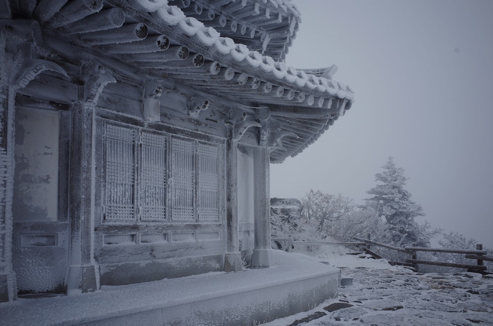 a building that is covered in snow and ice