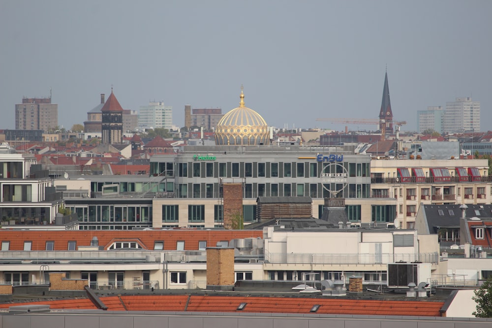 a view of a city with a dome in the background