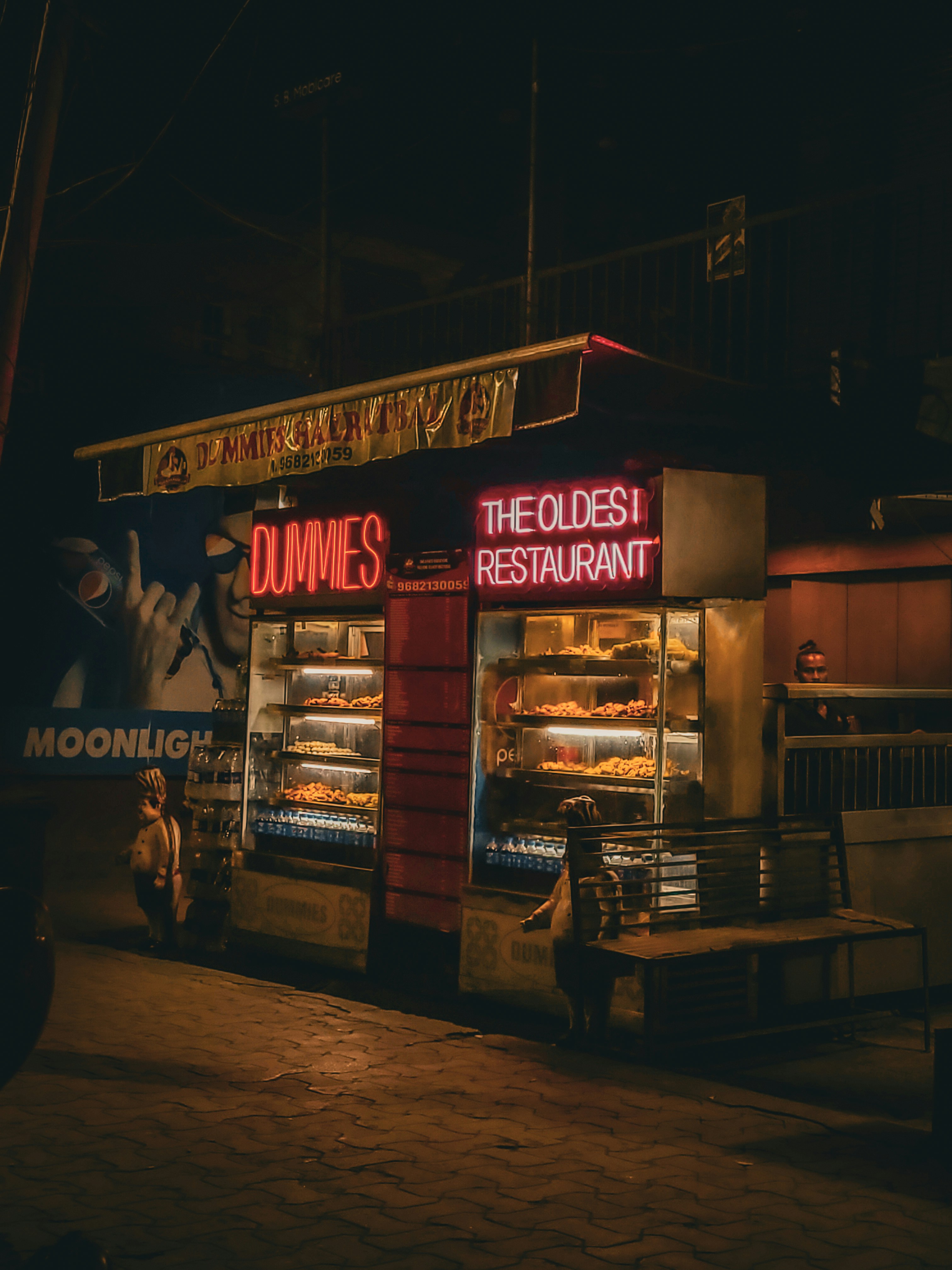 a restaurant with a sign that reads dumpies the oldest restaurant