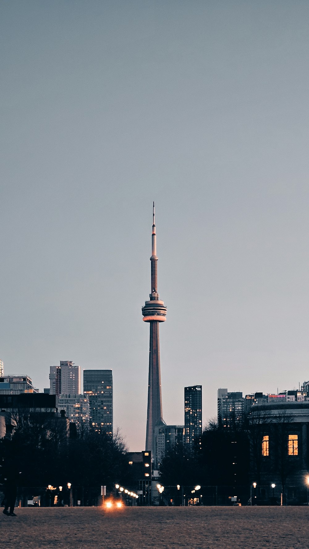 a view of a city with a very tall tower