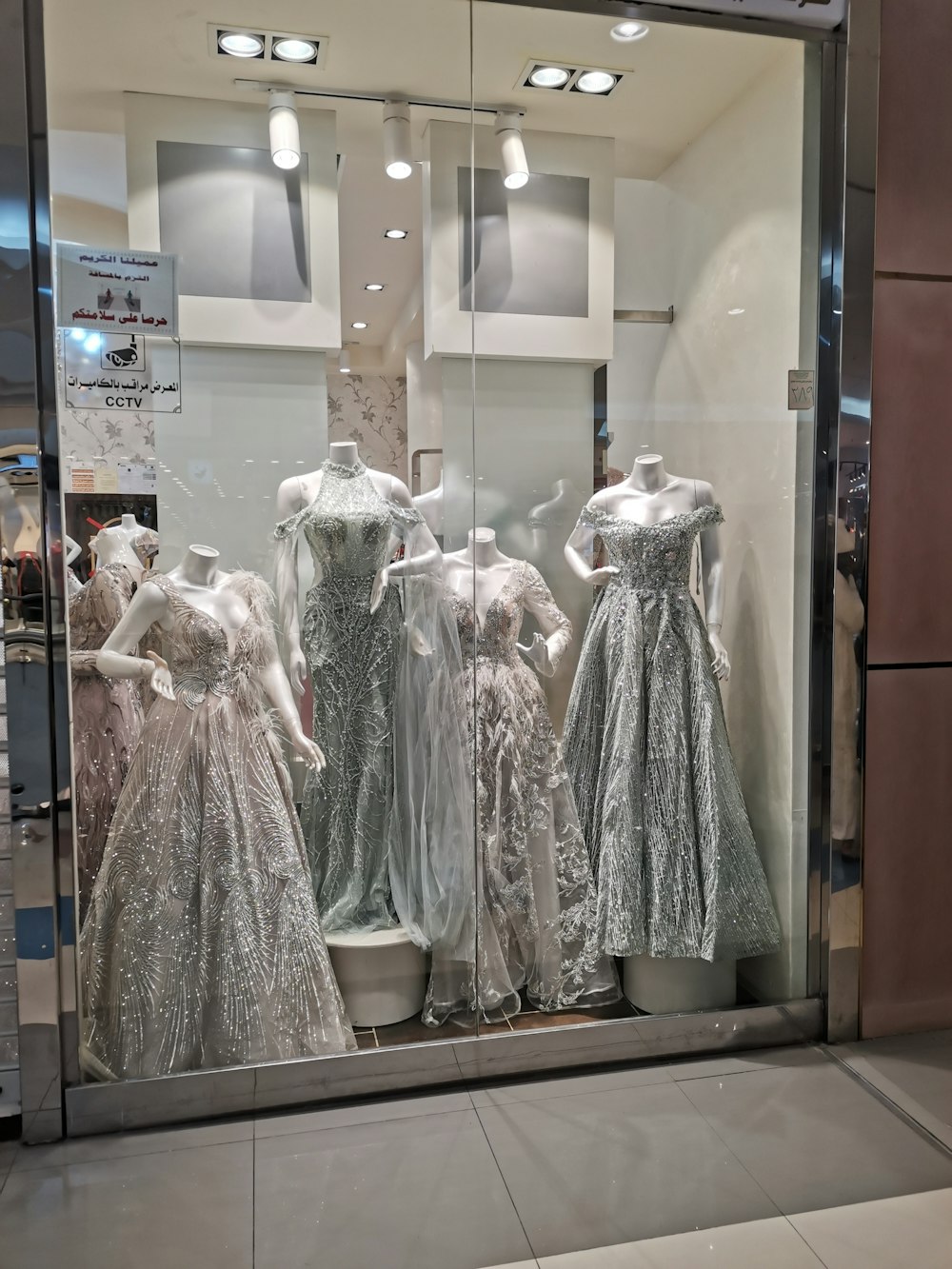 a display of dresses in a store window