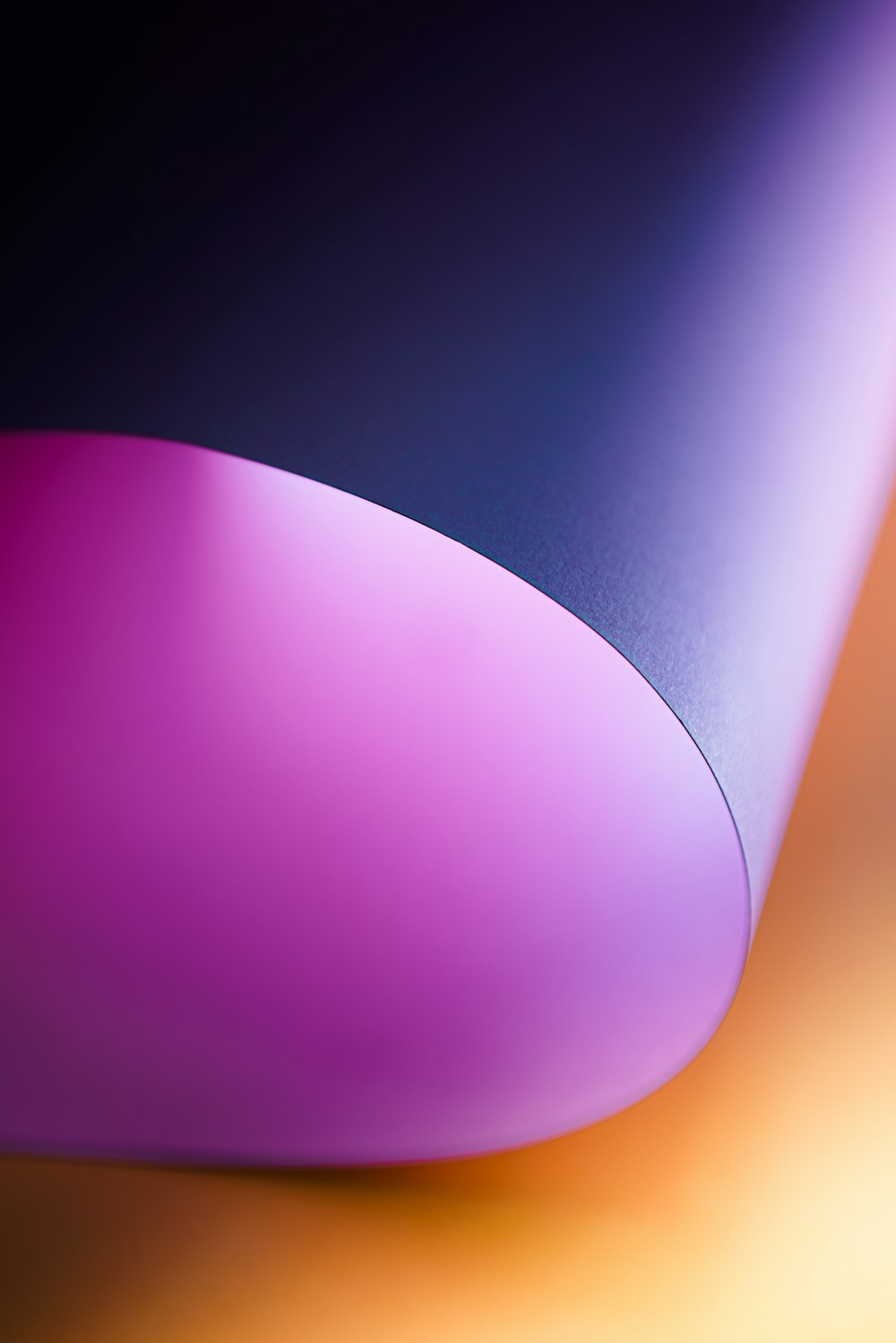 a close up of a purple object on a table